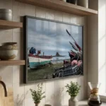 Holy Island crab catcher print in black frame