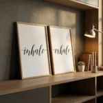 Inhale Exhale prints on shelf