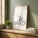 Get Naked print in modern bathroom next to towels
