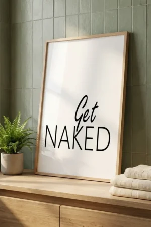 Get Naked print in modern bathroom next to towels