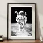 Astronaut Art Print in A3 Frame on Cabinet