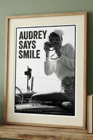 Audrey Hepburn print on green wall