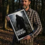 Man holding Bigfoot wall art print