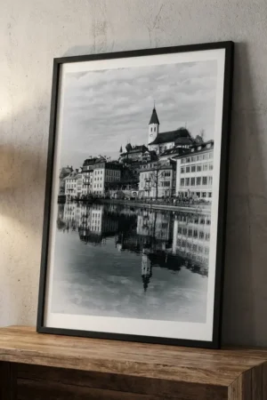 Thun Print in black frame leaning against wall