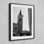 Framed Taormina bell tower black and white digital wall art print by Mark Marsh, showing the multi-tiered stone campanile and pointed spire detail.