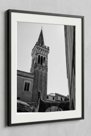 Framed Taormina bell tower black and white digital wall art print by Mark Marsh, showing the multi-tiered stone campanile and pointed spire detail.