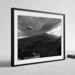 Gathering storm over Etna black and white digital download print in a black frame, capturing Sicilian storm drama by Mark Marsh.
