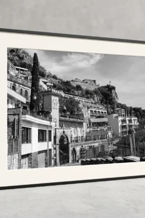 Framed Taormina Castello black and white digital wall art print by Mark Marsh, showing the ornate wrought-iron fence, arched windows, and stone architecture detail.
