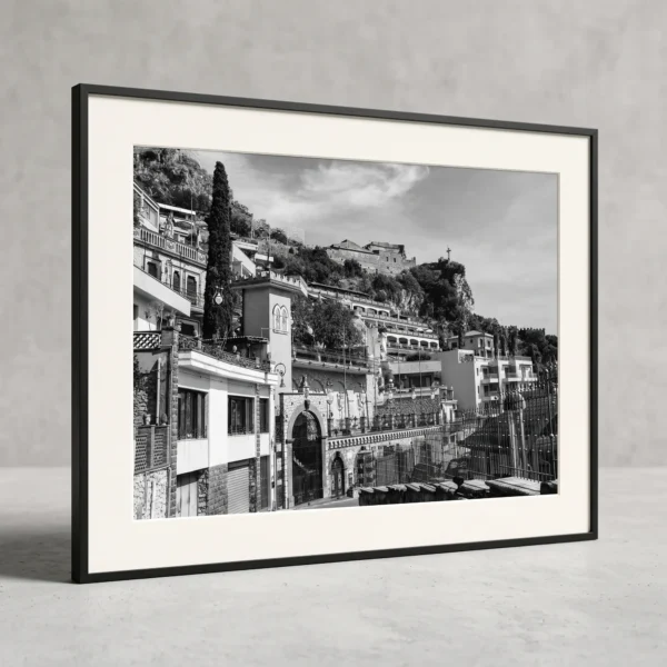 Madonna della Rocca digital print by Mark Marsh in A2 Frame Framed Taormina Castello black and white digital wall art print by Mark Marsh, showing the ornate wrought-iron fence, arched windows, and stone architecture detail.