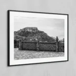 Framed Castelmola terrace black and white digital wall art print by Mark Marsh, showing the woven brick balustrade, stone pillars, and ceramic planter detail.
