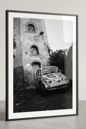 Castelmola Fiat 500 black and white digital download print in a black frame, capturing Sicilian street life by Mark Marsh.